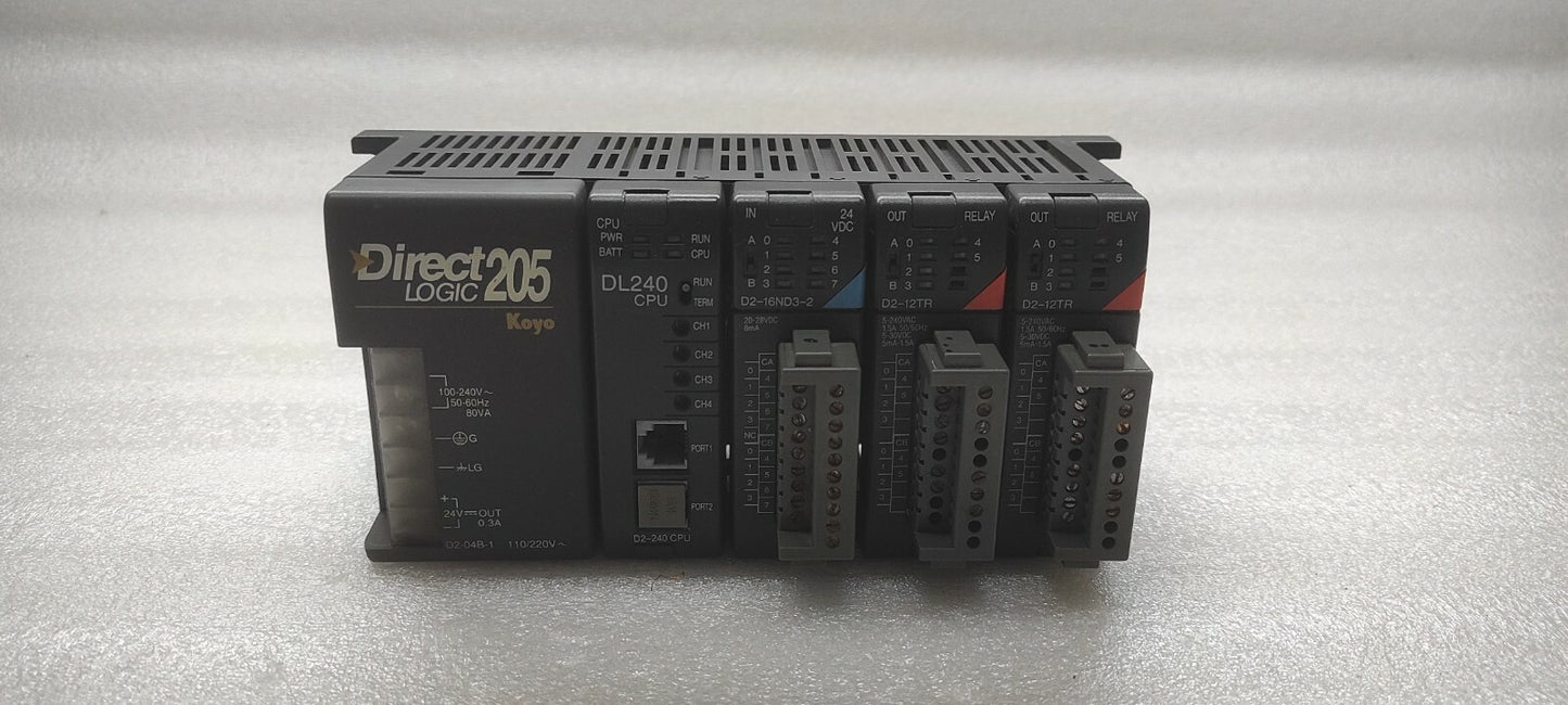KOYO DIRECT LOGIC 205 PLC D2-04B-1 PS D2-240 CPU D2-16ND3-2 IN D2-12TR OUT