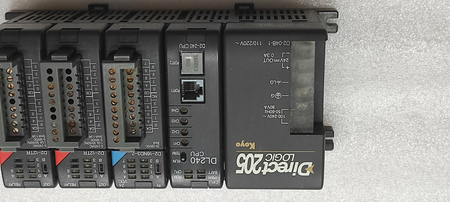 KOYO DIRECT LOGIC 205 PLC D2-04B-1 PS D2-240 CPU D2-16ND3-2 IN D2-12TR OUT